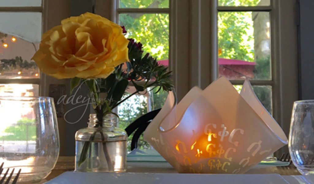 table setting with votive candle holder